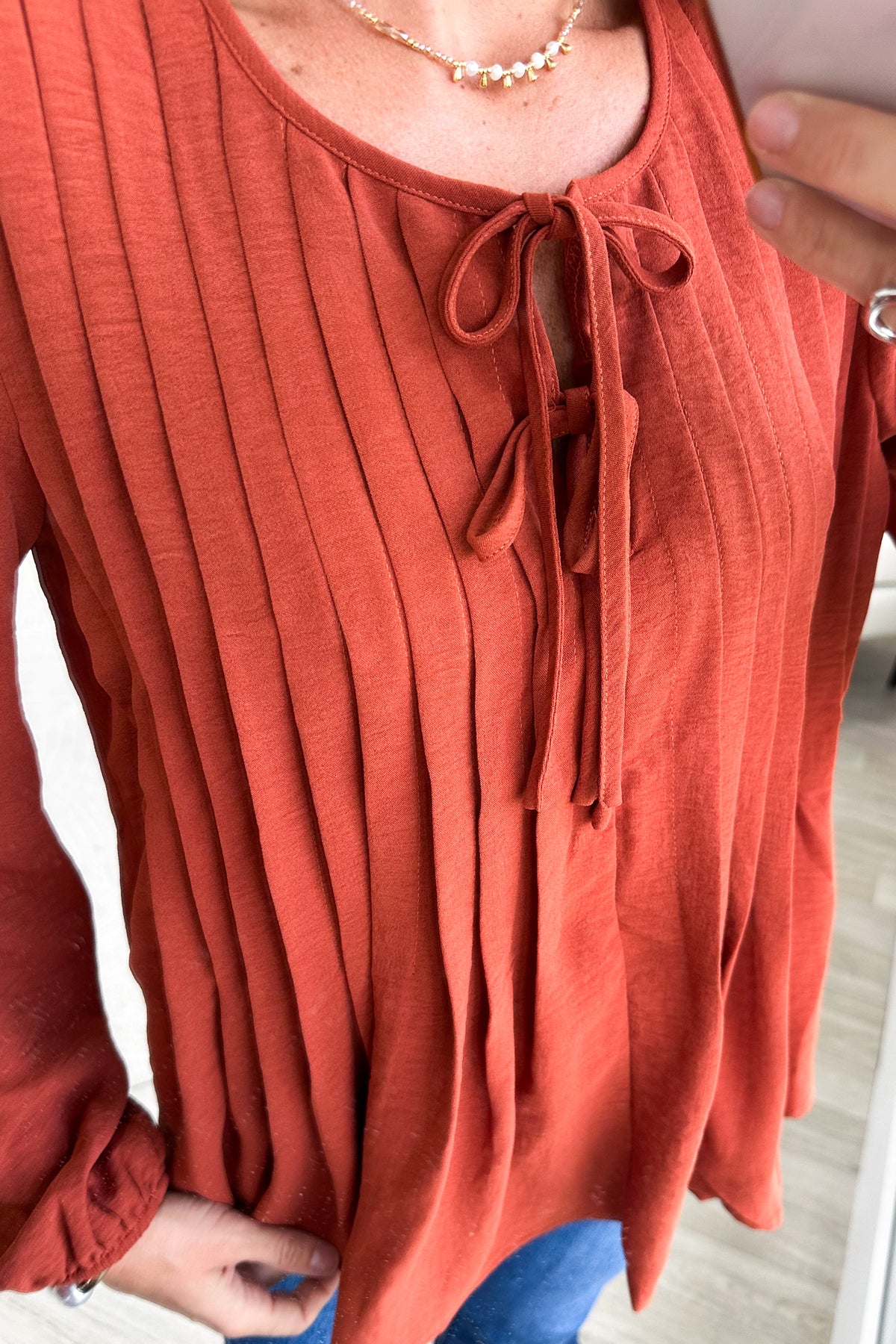 Rust Pleated Scoop Neck With Ribbon Bow Woven Top